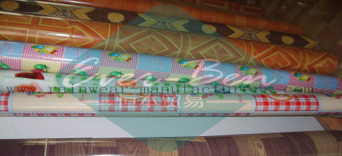 China pvc table cloth factory-vinyl tablecloth fabric by the roll